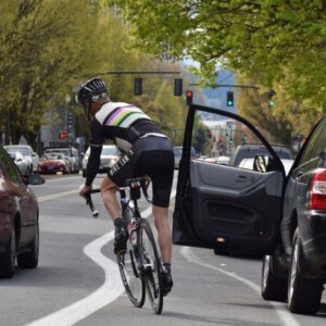 cyclist hit by car door